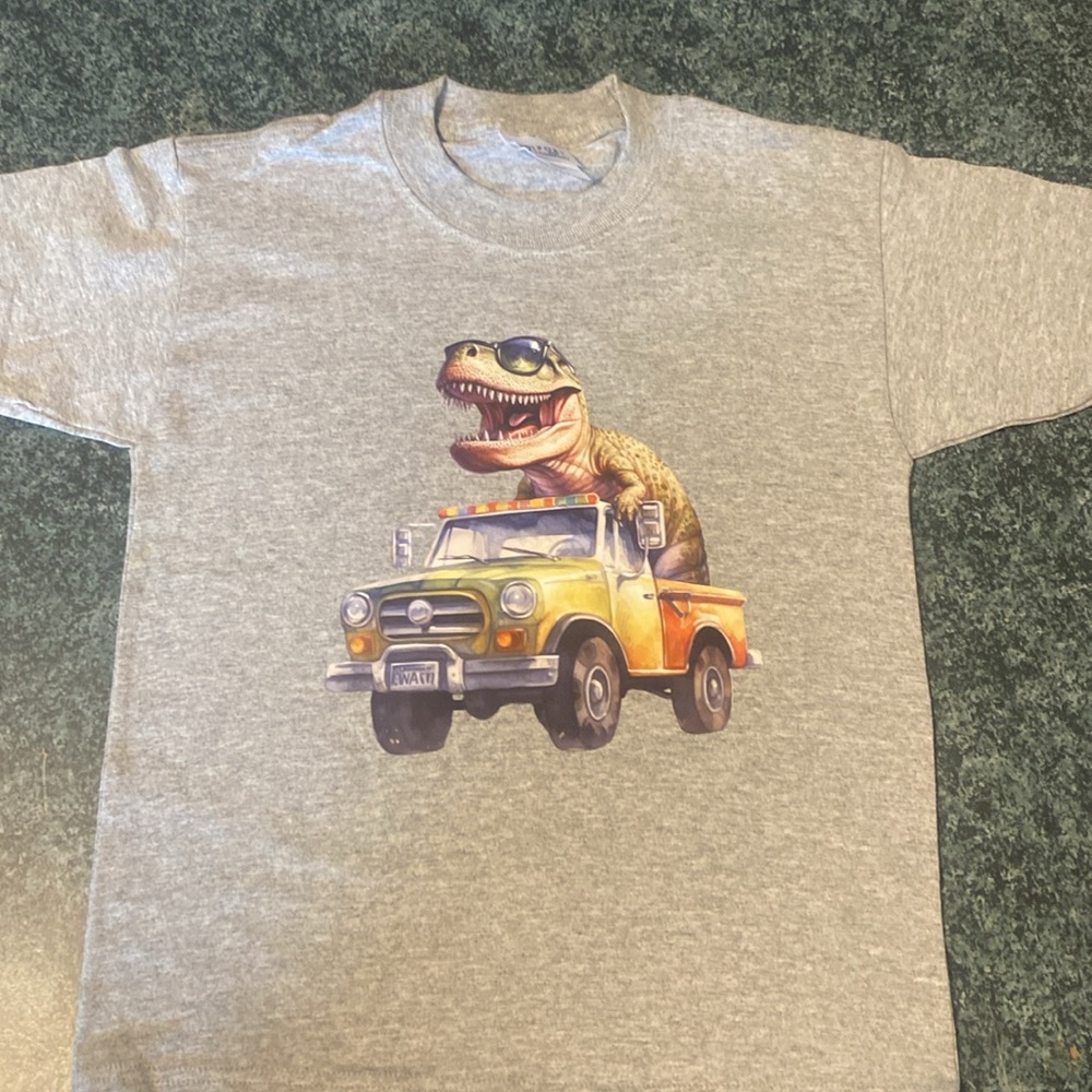 NWOT - Port and Company - Grey -Childs - Small (6-8). Dinosaur in back of Truck